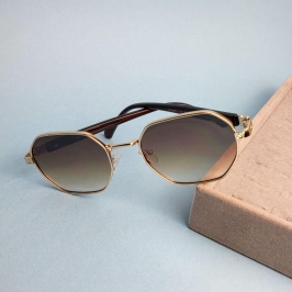 Oculos oval marrom armacao dourada