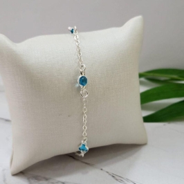 PULSEIRA DE PRATA 925 COM 4 ZIRCONIAS AZUIS CLARO TAM20CM