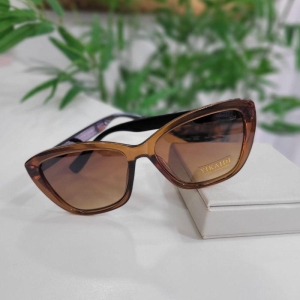 Oculos oval marrom armacao transparencia marrom perna preta