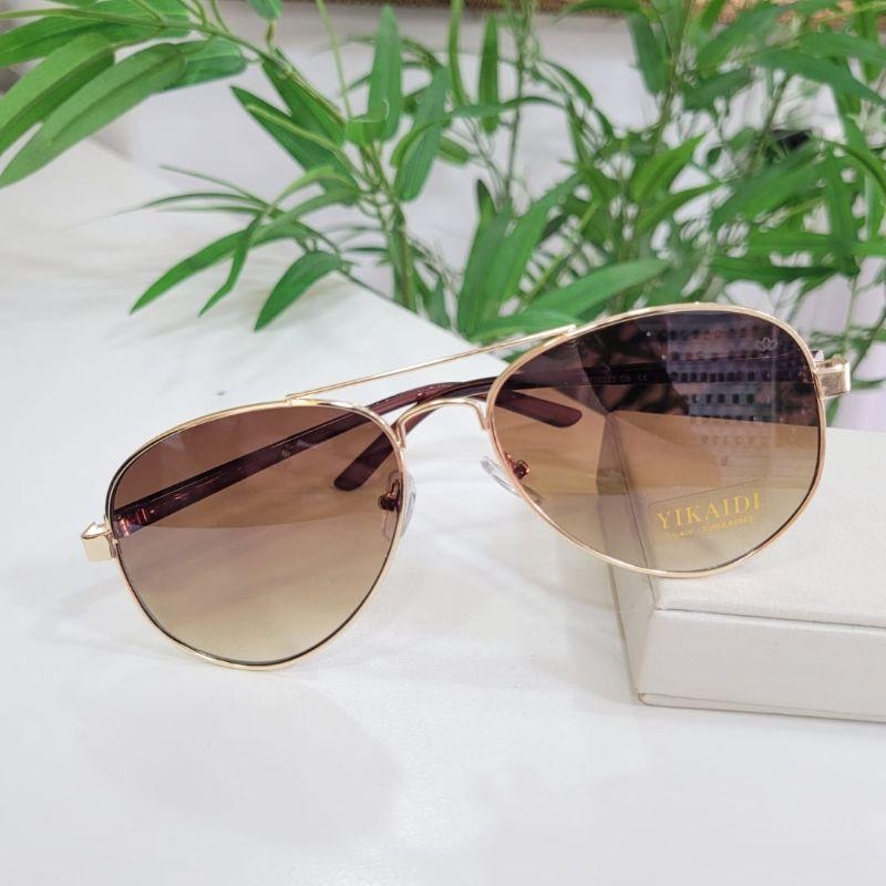 Oculos oval caramelo armacao no dourada