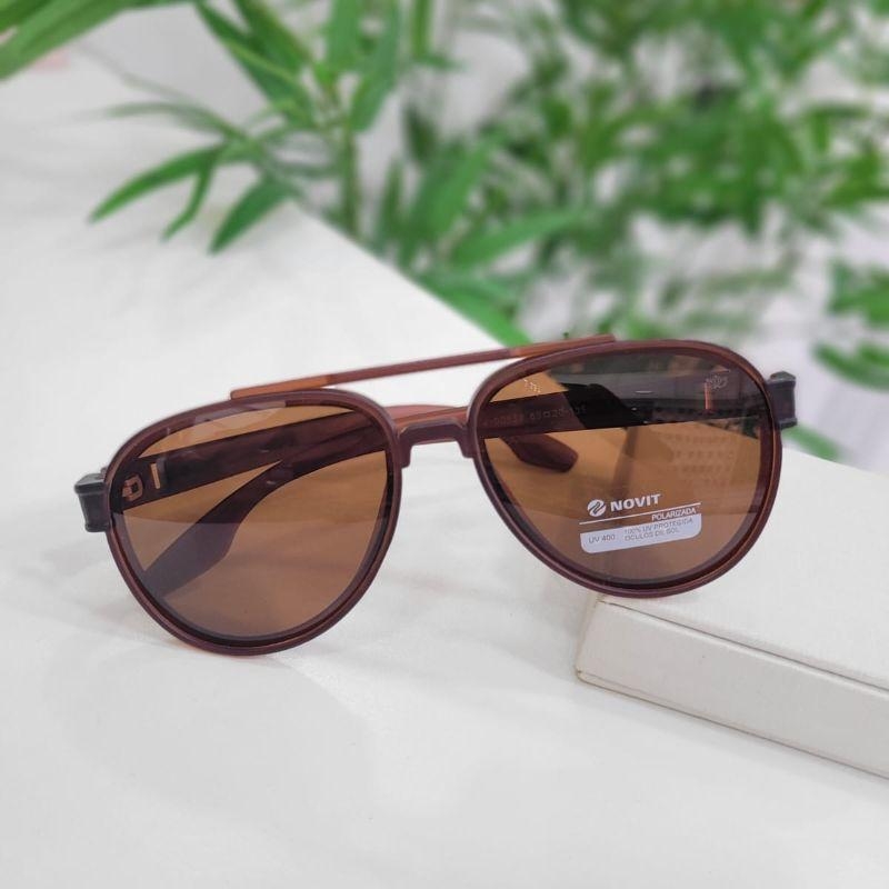Oculos oval marrom armacao marrom detalhe vermelho na perna