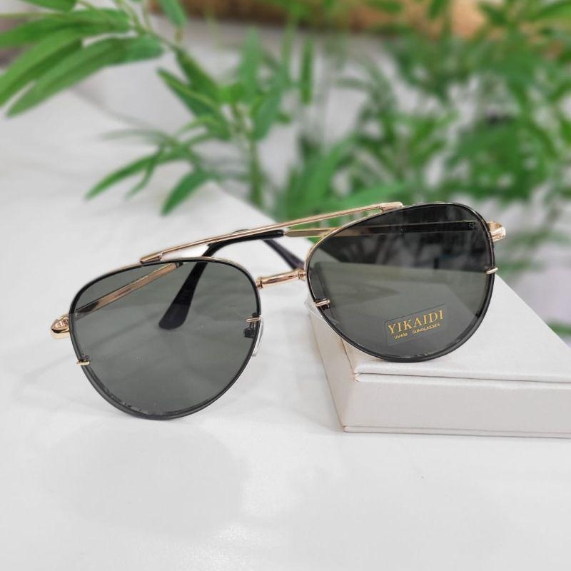 Oculos oval verde armacao dourada