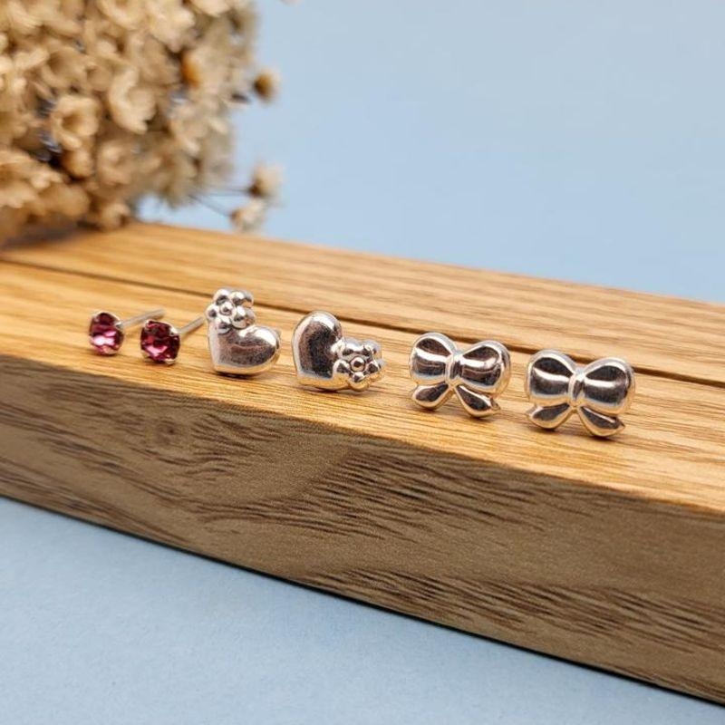 BRINCO TRIO DE PRATA 925 LAÇO, CORAÇÃO, PONTO DE LUZ