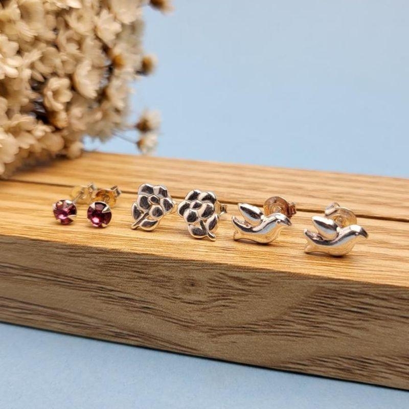 BRINCO TRIO DE PRATA 925 POMBA, FOLHA, PONTO LUZ