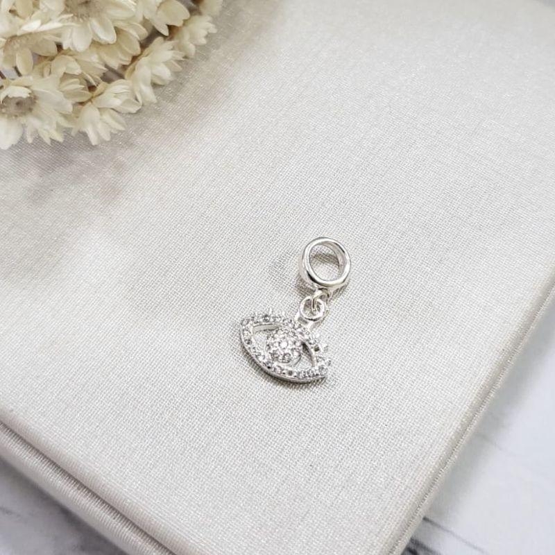 BERLOQUE OLHO GREGO CRAVEJADO