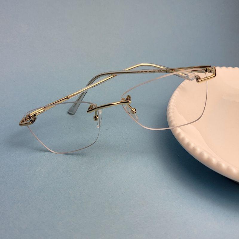 Armacao para oculos de grau gatinho parafusado dourado com transparencia