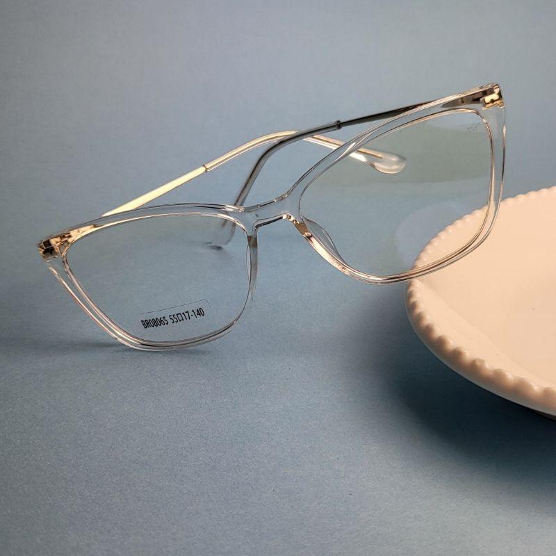 Armacao para oculos de grau quadrada estilo gatinho na cor transparente com perna dourada