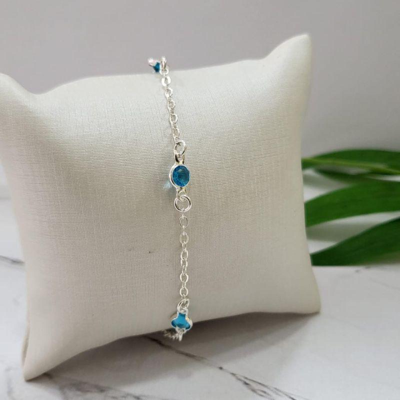 PULSEIRA DE PRATA 925 COM 4 ZIRCONIAS AZUIS CLARO