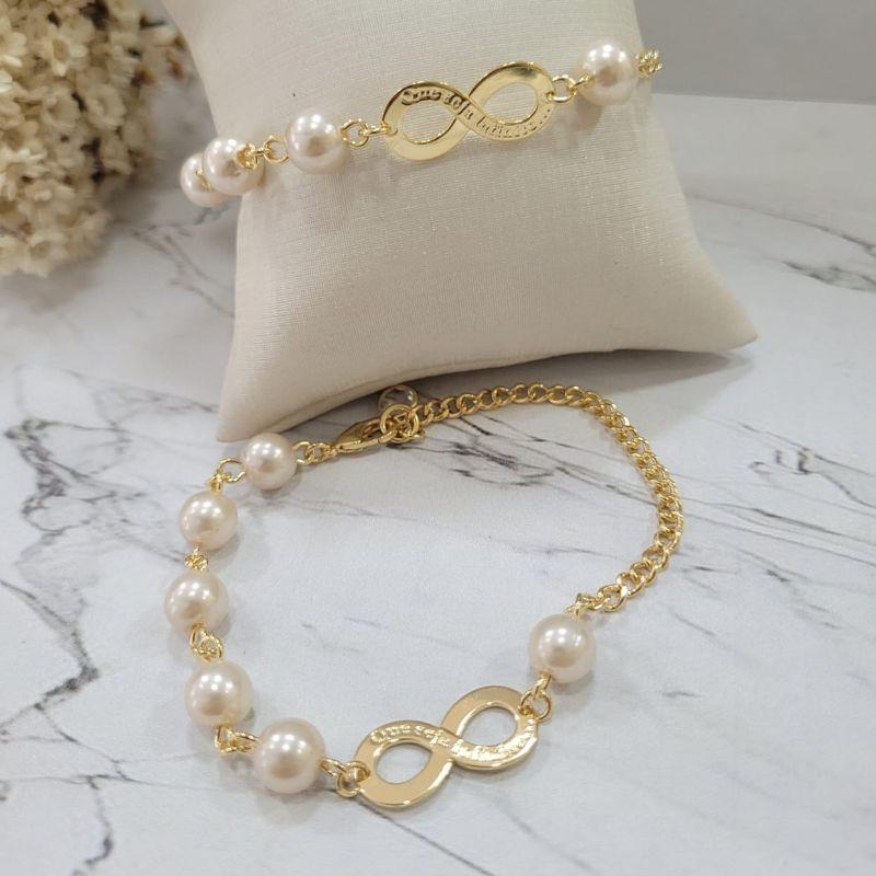 Pulseira perolas e infinito com extensor e ponto de luz na ponta frase que seja infinito banhado a ouro 18k
