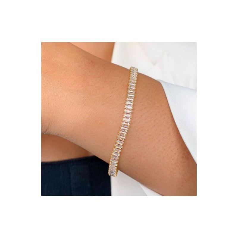 Pulseira riviera na navete na cor cristal com extensor banhado a ouro 18k