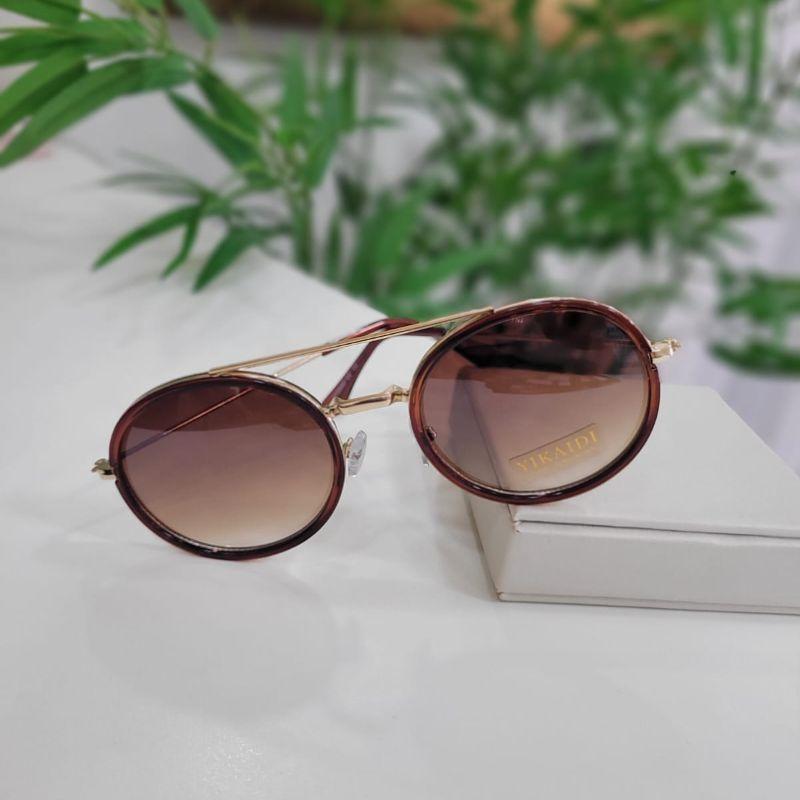 Oculos redondo caramelo armacao dourada