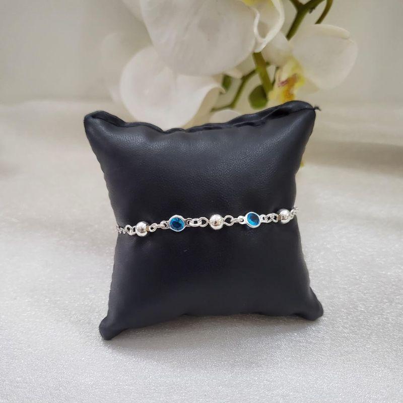 PULSEIRA DE PRATA 925 COM 2 ZIRCÔNIAS AZUL CLARO E 3 BOLINHAS