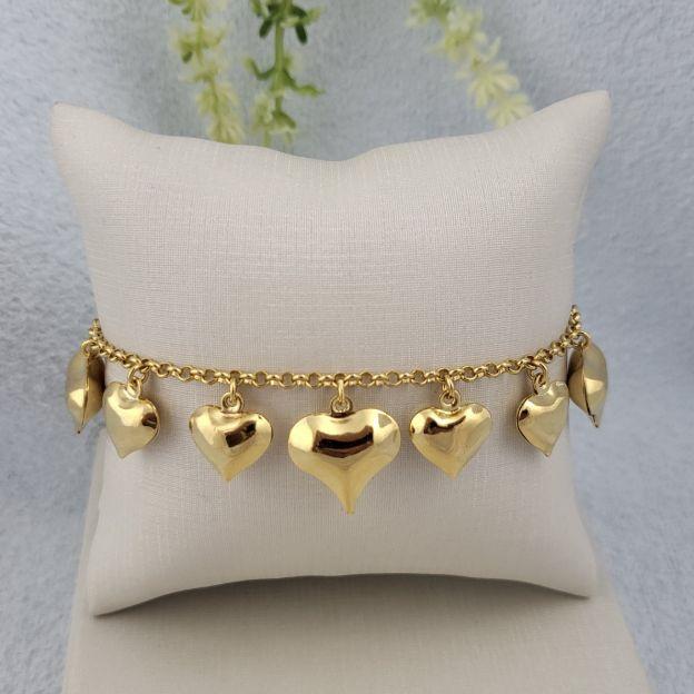 Pulseira elo portugues com 7 coracoes com extensor  banhado a ouro 18k