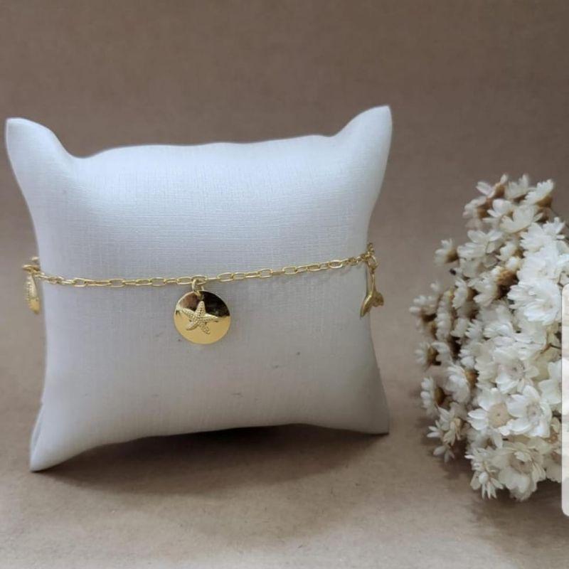 PULSEIRA COM PINGENTES ANCORA CONCHA CALDA DE SEREIA BUZIOS BANHADO A OURO 18K TAM20CM