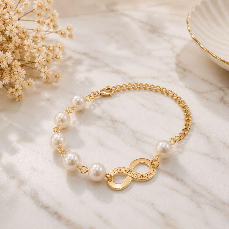 Pulseira perolas e infinito com extensor e ponto de luz na ponta frase que seja infinito banhado a ouro 18k TAM21CM